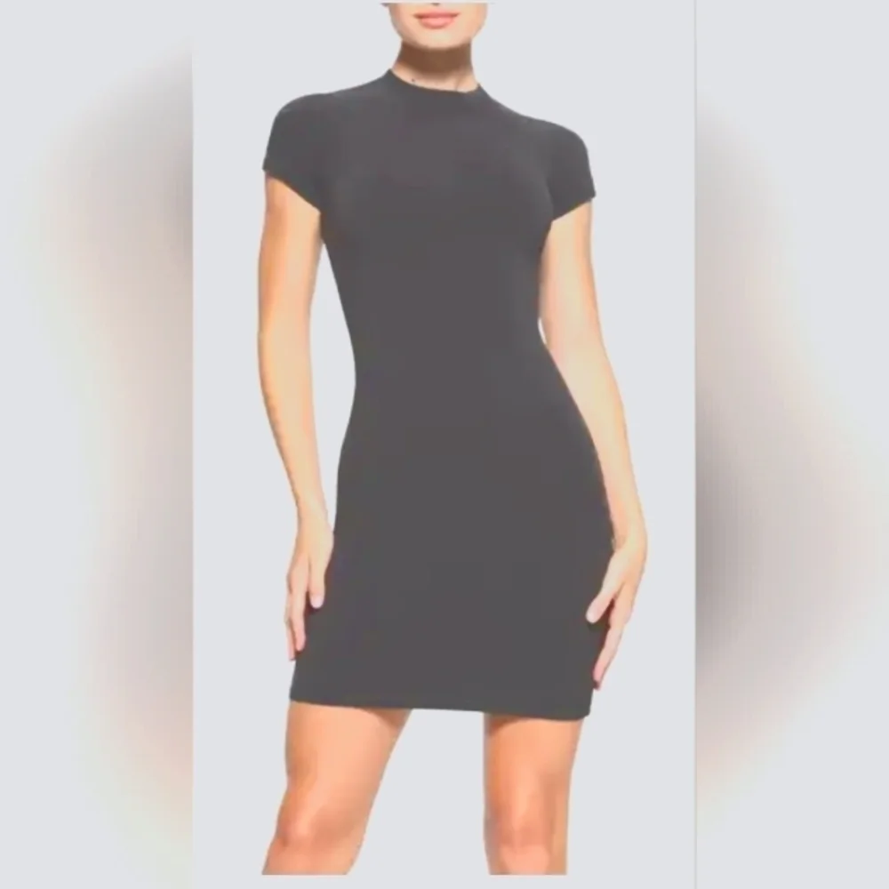 Skims recycled swim dress.